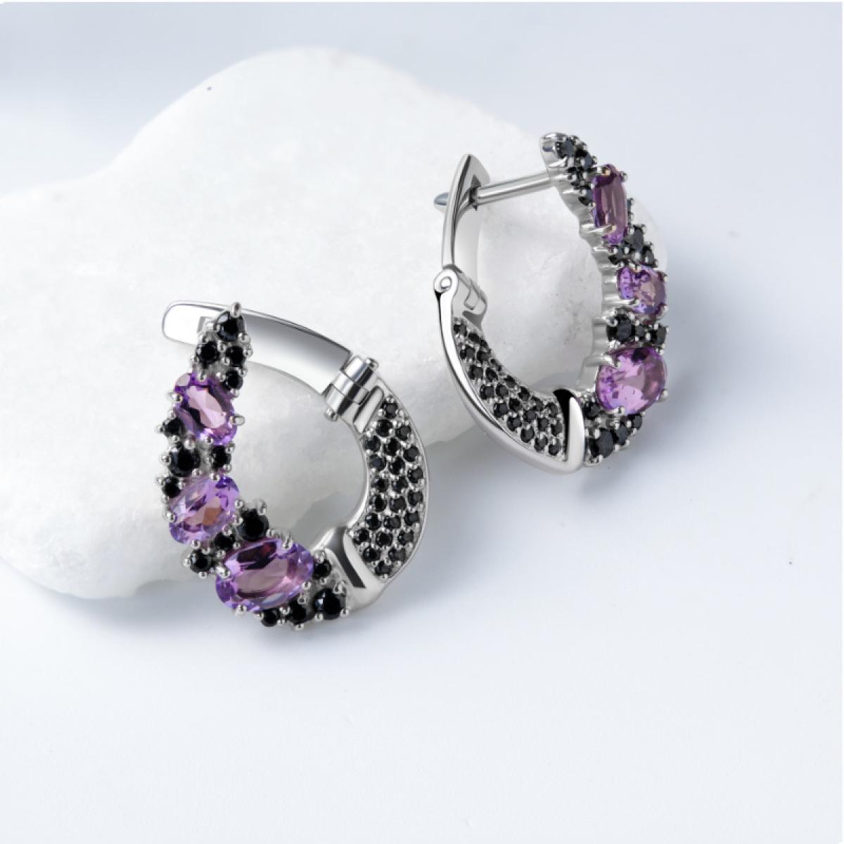 Les boucles d’oreilles design raffiné
